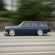 Illustration for article titled True Hero Swapped A Volvo Amazon Wagon Body Onto A BMW E30 In His Driveway